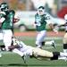 Eastern Michigan junior Alex Gillett gets tangled up by sophomore Johnnie Simon during the first quarter against Western Michigan at Rynearson Stadium on Saturday afternoon. Melanie Maxwell I AnnArbor.com
